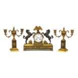 A French two-colour gilt-bronze three-piece clock garniture,