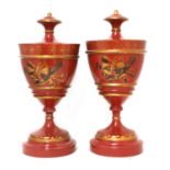 A pair of Regency-style toleware urns