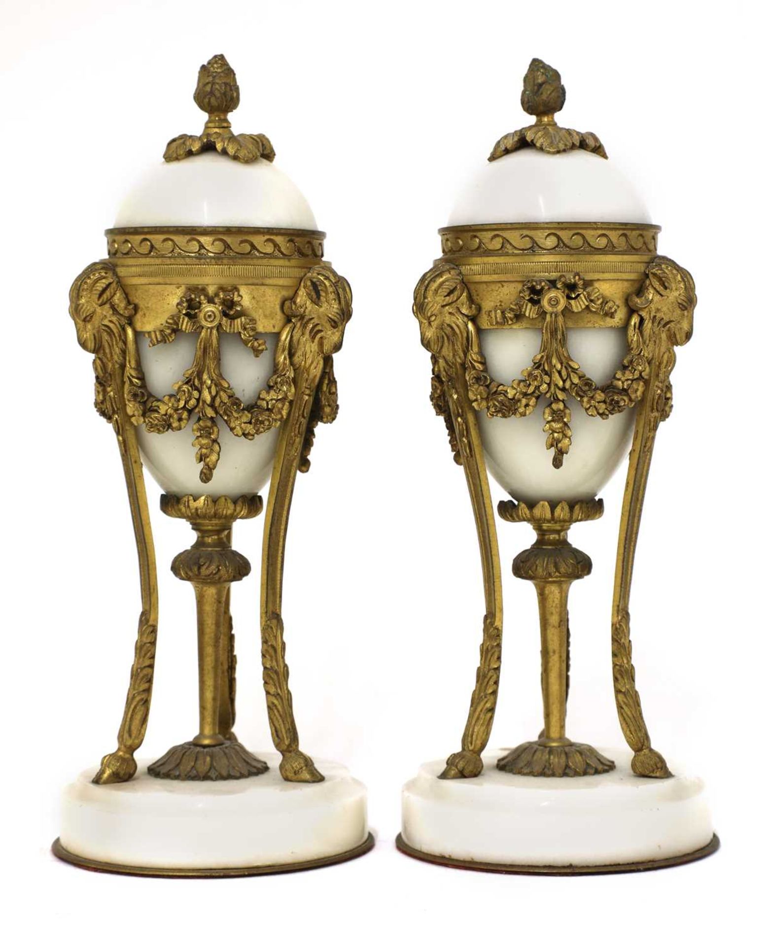 A pair of French Empire-style white marble and ormolu cassolettes,