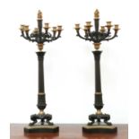 A pair of large gilt and patinated bronze seven-light candelabra,