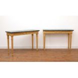 A pair of giltwood console tables in the manner of Robert Adam,