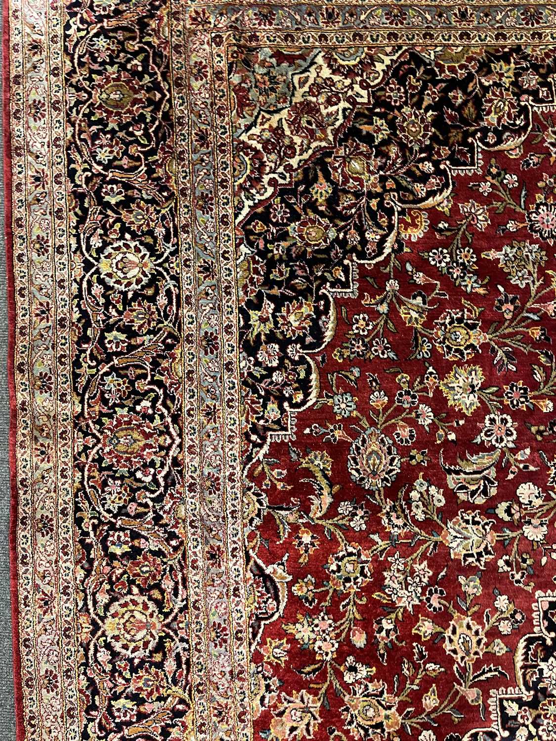 A Persian wool and silk Kashan carpet, - Image 9 of 15