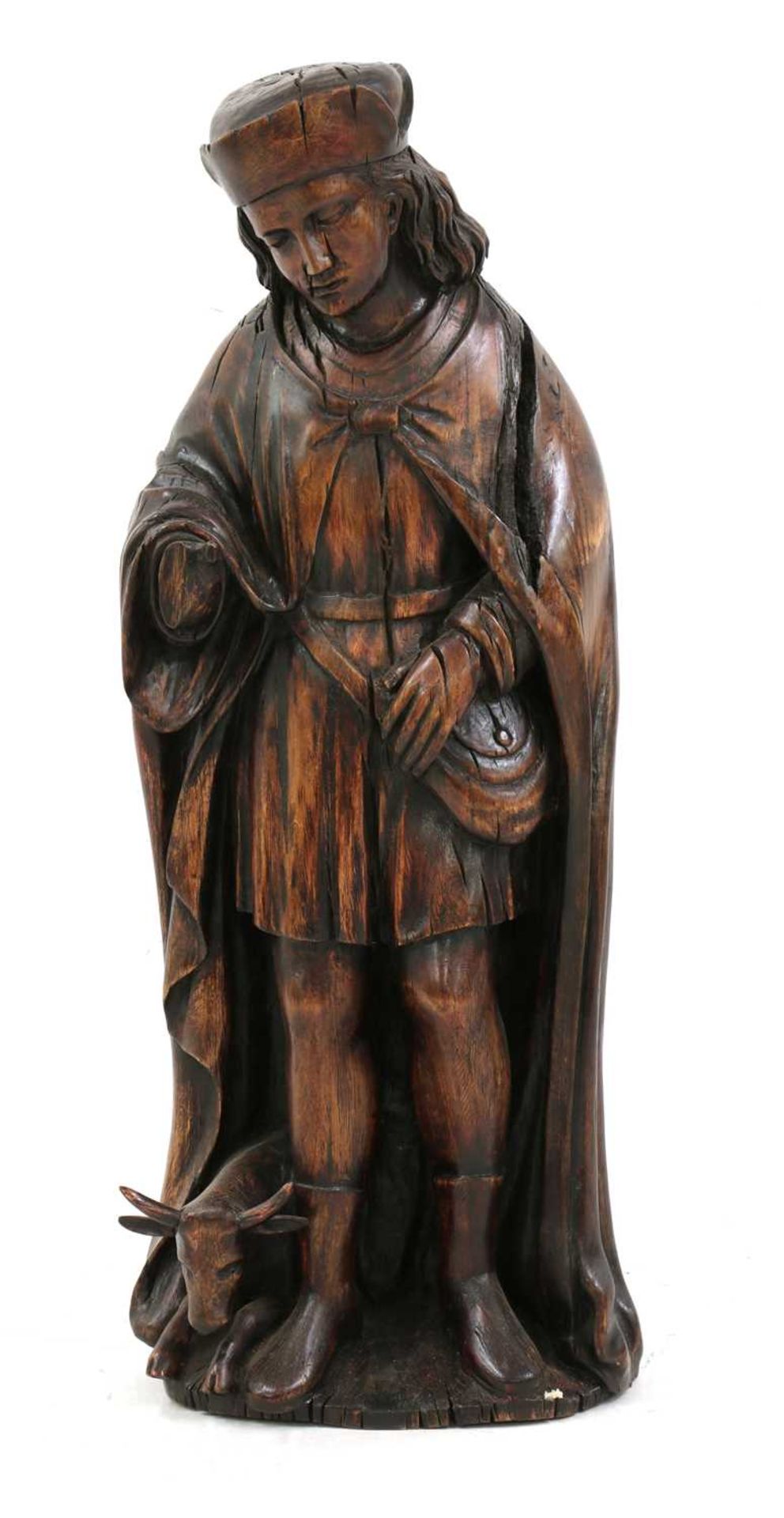 An Austrian carved wood figure of a hunter,