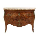 A French Louis XV kingwood, marquetry-inlaid and ormolu-mounted commode,