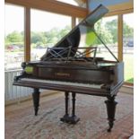 A Victorian mahogany baby grand piano by Bechstein,