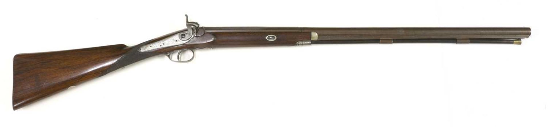 A single-barrelled percussion 12-bore shotgun,