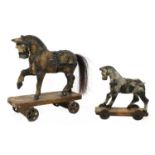 A folk art pull-along toy horse,