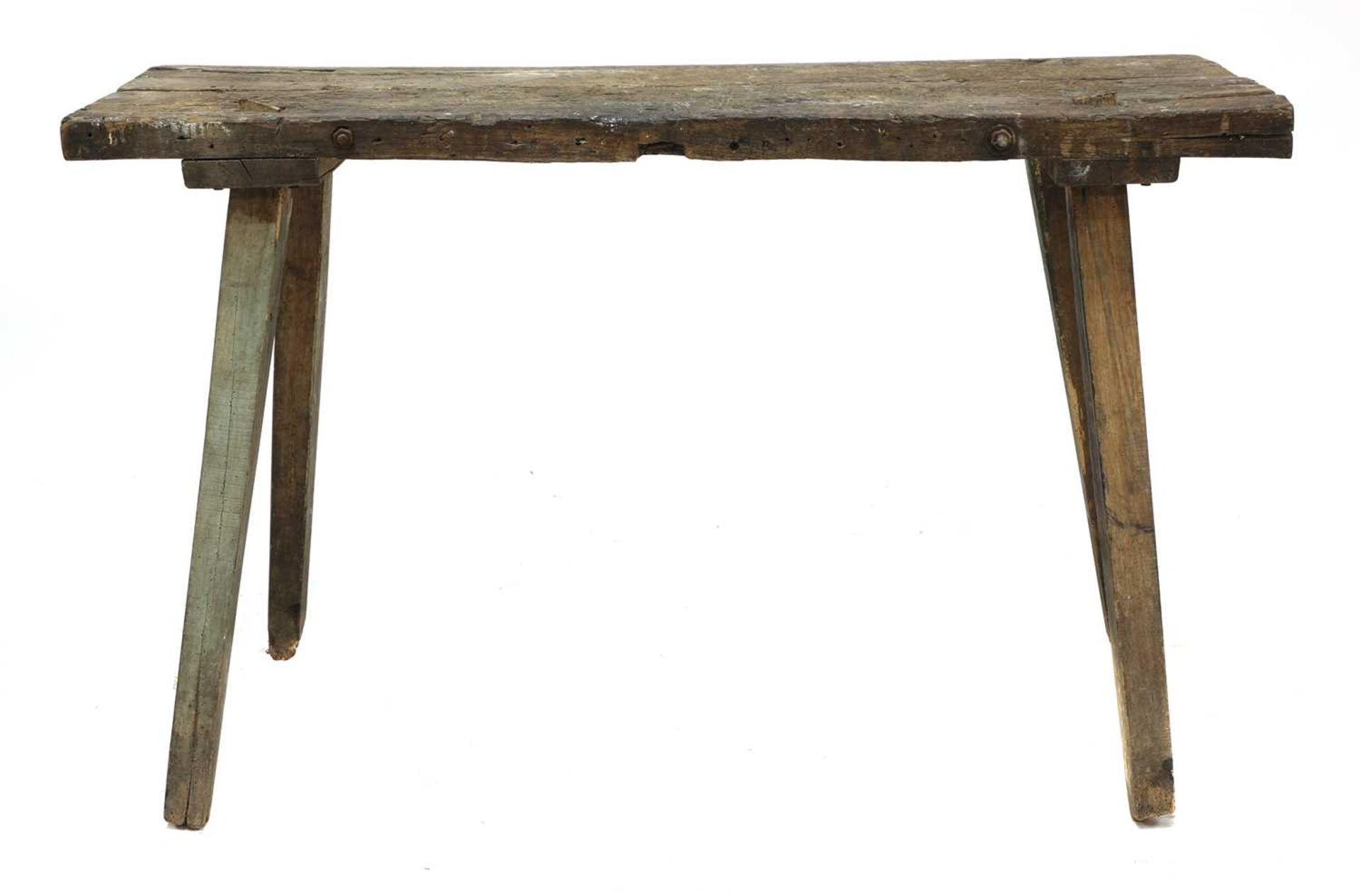 A rustic oak workbench,