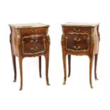 A pair of French Louis XV-style kingwood and ormolu night tables,