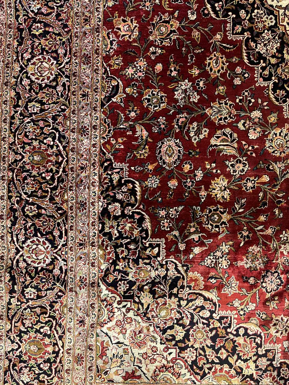 A Persian wool and silk Kashan carpet, - Image 8 of 15