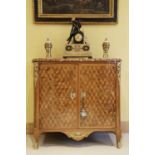 A Royal French Louis XV kingwood, tulipwood, sycamore and parquetry inlaid meuble d'entrée,