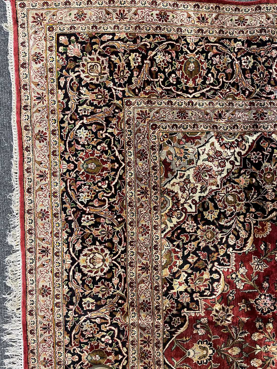 A Persian wool and silk Kashan carpet, - Image 13 of 15