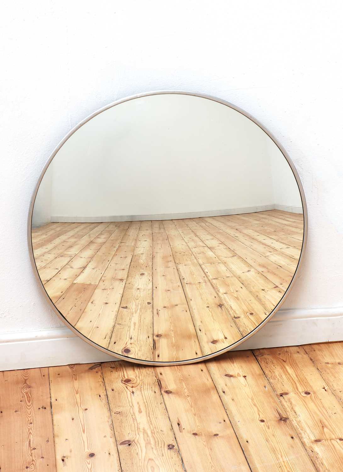 A convex wall mirror,