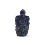 A carved lapis lazuli figure of Ganesha