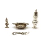 A silver sugar shaker of baluster form,