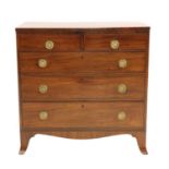 A small George III mahogany chest of drawers,