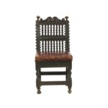 A late 17th century oak standard chair,