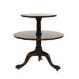 A 19th century circular rosewood two tier table