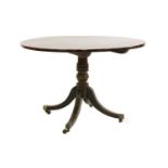 A George III circular rosewood and grained loo table