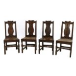 A set of four 18th century and later carved oak chairs,