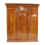 A Victorian mahogany triple door wardrobe,