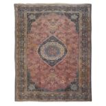 A large Persian Mashad carpet,