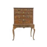 An early 18th century walnut chest on stand,