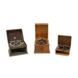 Three old wooden wind up gramophones