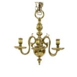 A Dutch style brass chandelier,