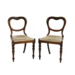 A pair of Victorian rosewood chairs,