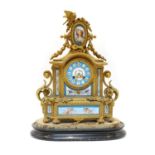 A French Louis XVI-style gilt-bronze mantel clock,