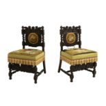 A pair of 19th century carved walnut chairs