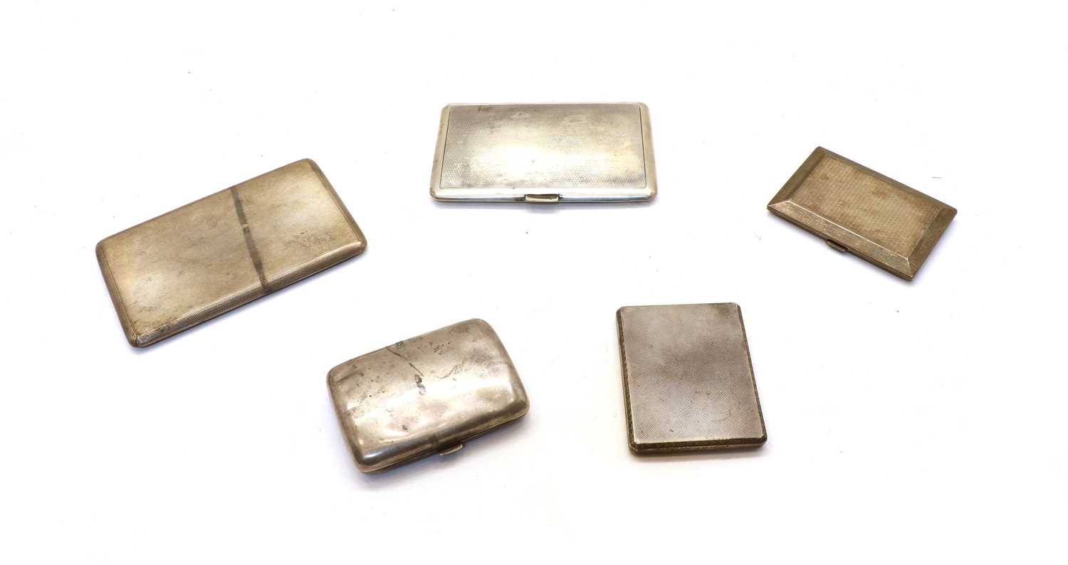 A collection of five silver cigarette cases,