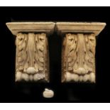 A pair of neoclassical reconstituted stone corbels,