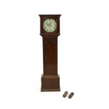 A provincial oak eight day longcase clock,