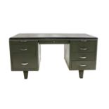 A mid 20th century metal pedestal desk,