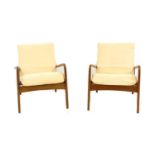 A pair of teak armchairs,