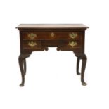 A George III oak lowboy,