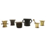A collection of antique mortars,