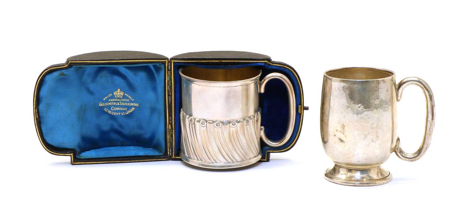 A cased Victorian silver christening mug,