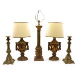 A pair of gilt table lamps,
