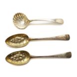 A pair of George III silver berry spoons,