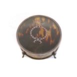 A silver and tortoiseshell dressing table box,