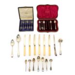 A collection of silver flatware,