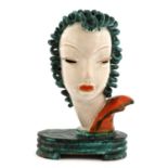 A Goldscheider pottery free-standing bust of a lady,