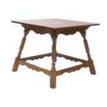 An Arts and Crafts oak side table,