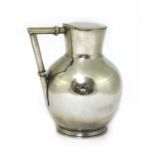 A silver-plated lidded jug,