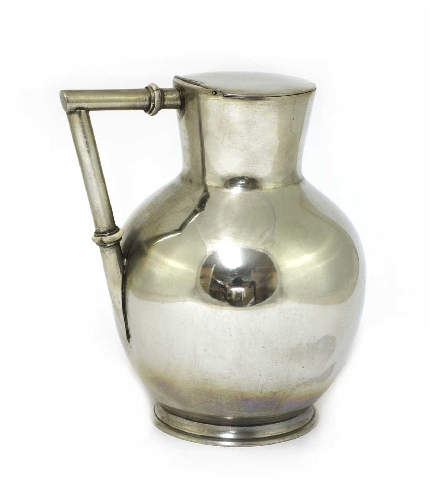 A silver-plated lidded jug,