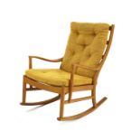 A Parker Knoll beechwood rocking chair,