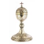 A silver chalice and cover,